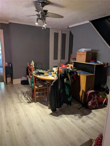 a room with furniture and gym equipment