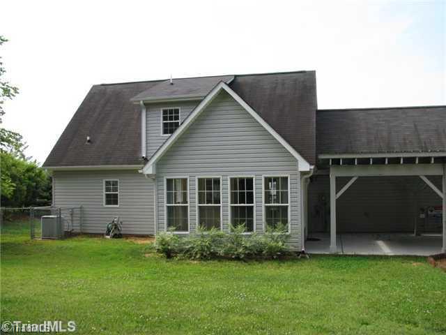 6045 Holder Road Clemmons, NC 27012 - Photo 15 of 16 Exterior Back. Great fence back yard.