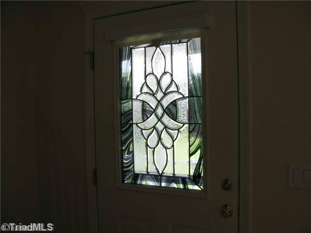 6045 Holder Road Clemmons, NC 27012 - Photo 4 of 16 Entry. Stained glass front door.