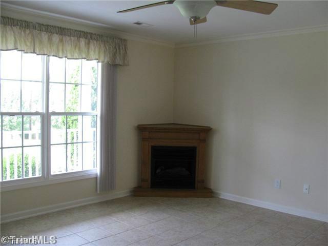 6045 Holder Road Clemmons, NC 27012 - Photo 5 of 16 Living Room. Fireplace to make that living room cozy.