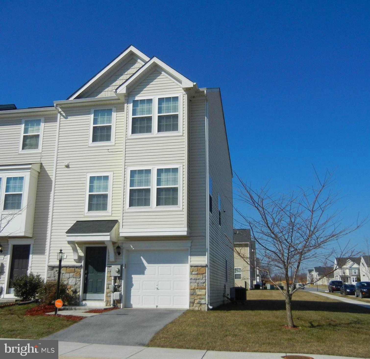Looking  for a large end unit garage townhouse?