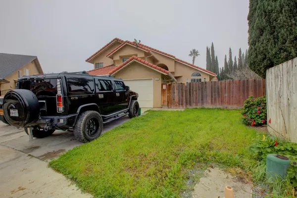 a car parked in front of a house