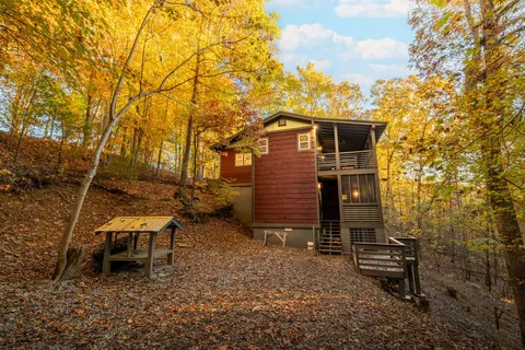 a view of outdoor space and front view of a house