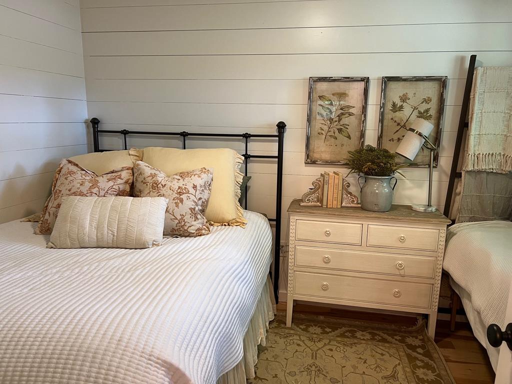 210 East Overbend Trail Blue Ridge, GA 30513 - Photo 56 of 69 a bedroom with a bed and large mirror on the dresser