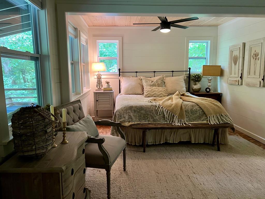 210 East Overbend Trail Blue Ridge, GA 30513 - Photo 62 of 69 a bedroom with bed and window