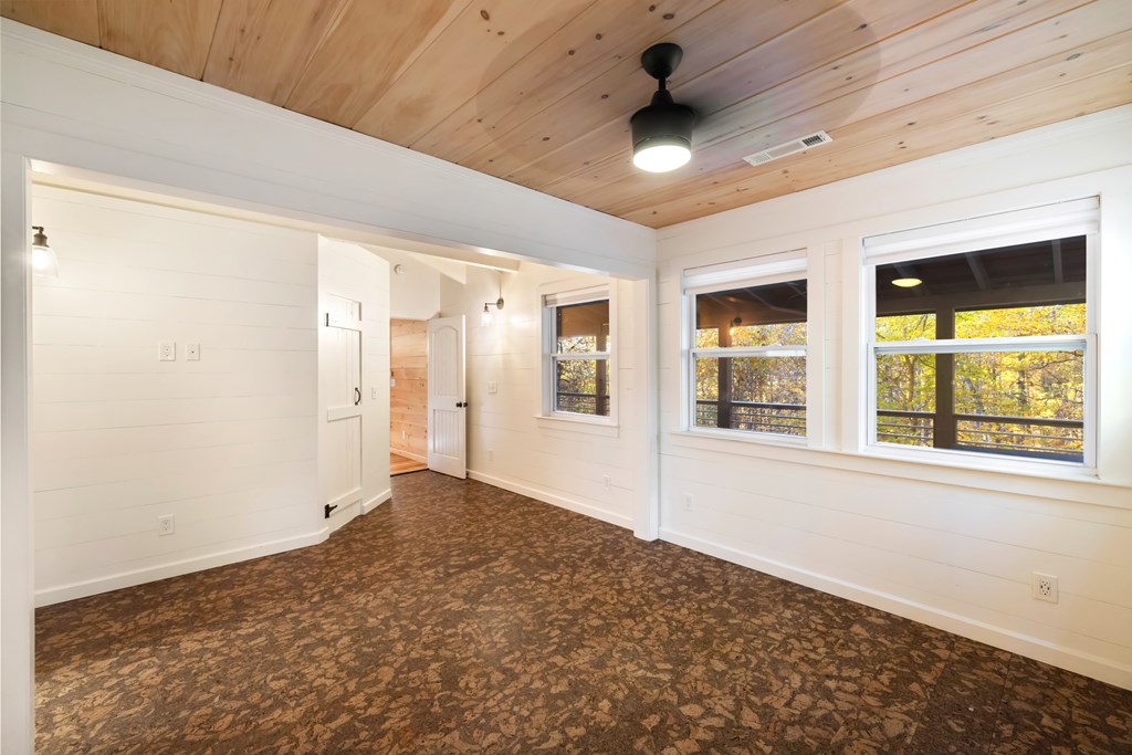 210 East Overbend Trail Blue Ridge, GA 30513 - Photo 10 of 38 a view of an empty room with a window