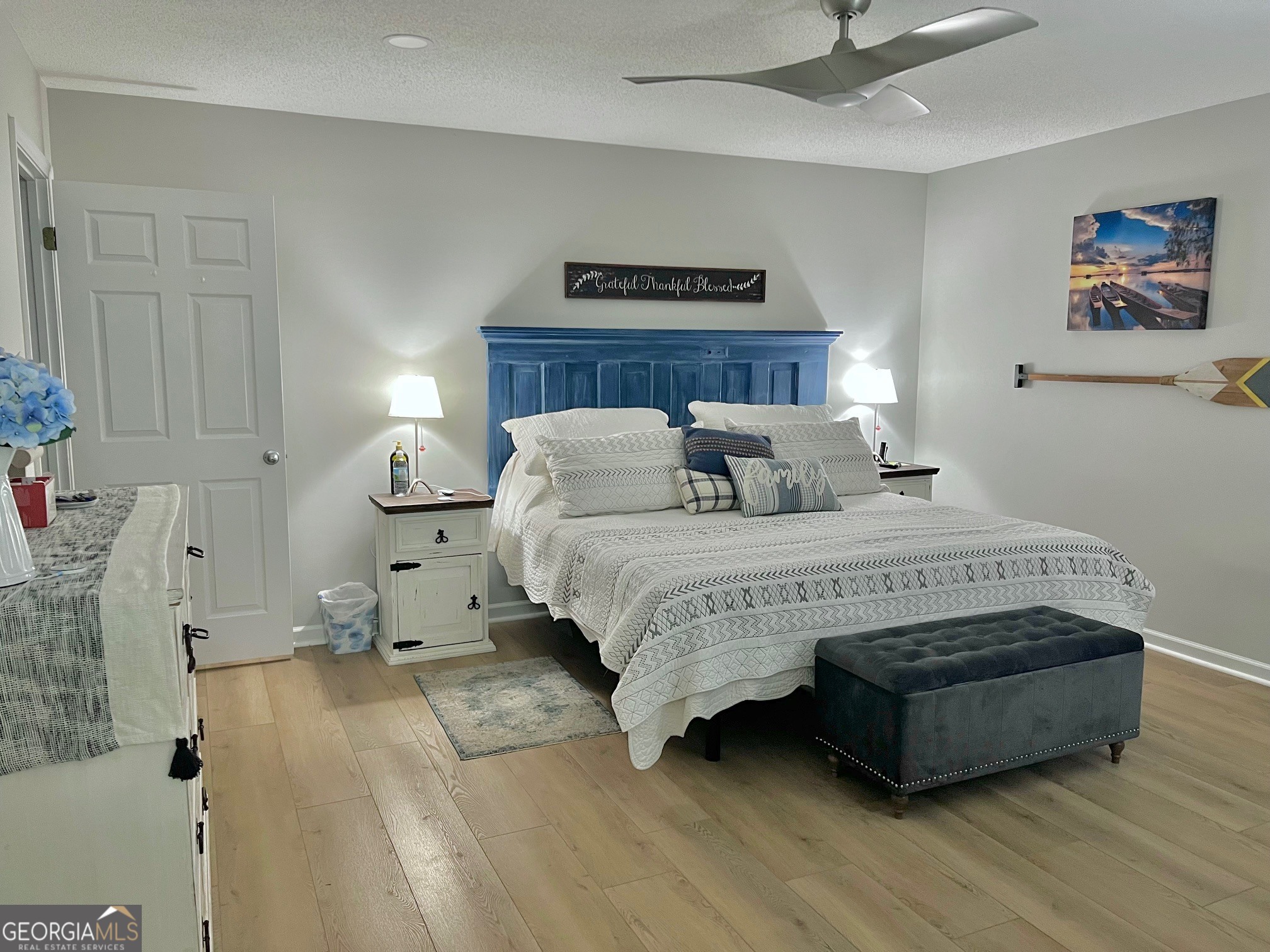 427 Chandler's Ridge Drive Chatsworth, GA 30705 - Photo 21 of 40 a spacious bedroom with a bed and a couch