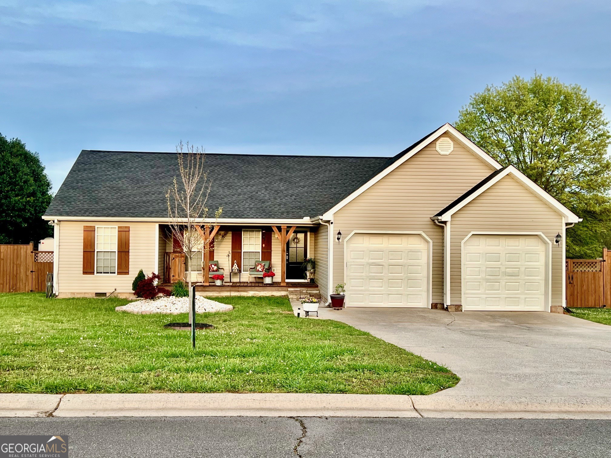 427 Chandler's Ridge Drive Chatsworth, GA 30705 - Photo 3 of 40 a front view of a house with a yard and garage