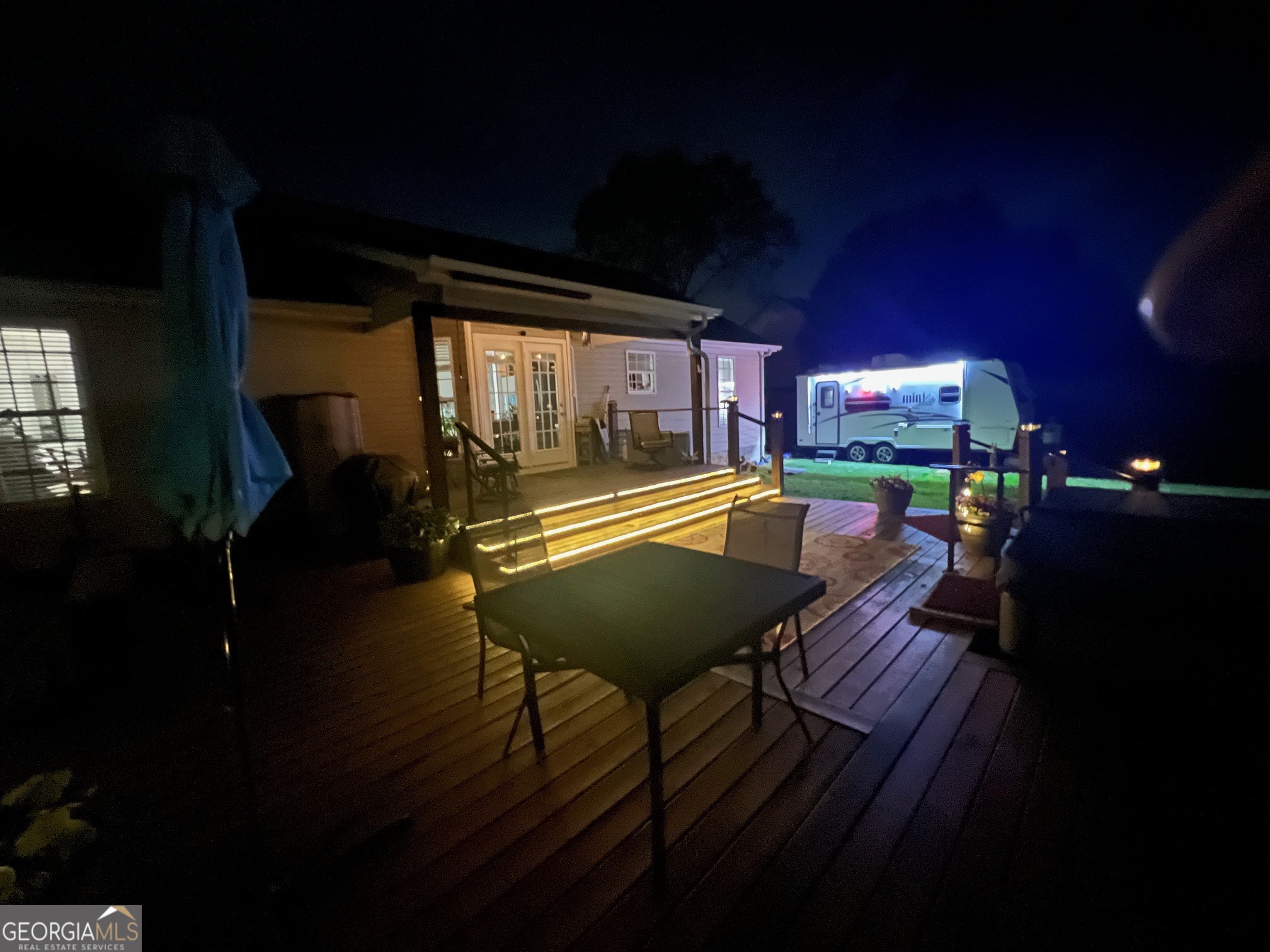 427 Chandler's Ridge Drive Chatsworth, GA 30705 - Photo 36 of 40 a view of a chairs and table in the patio