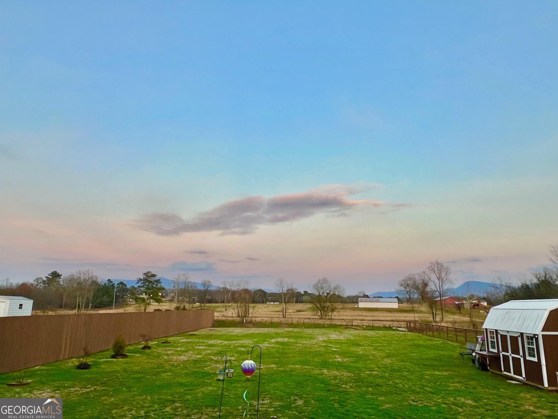 427 Chandler's Ridge Drive Chatsworth, GA 30705 - Photo 4 of 40 a view of a lake with houses in the back