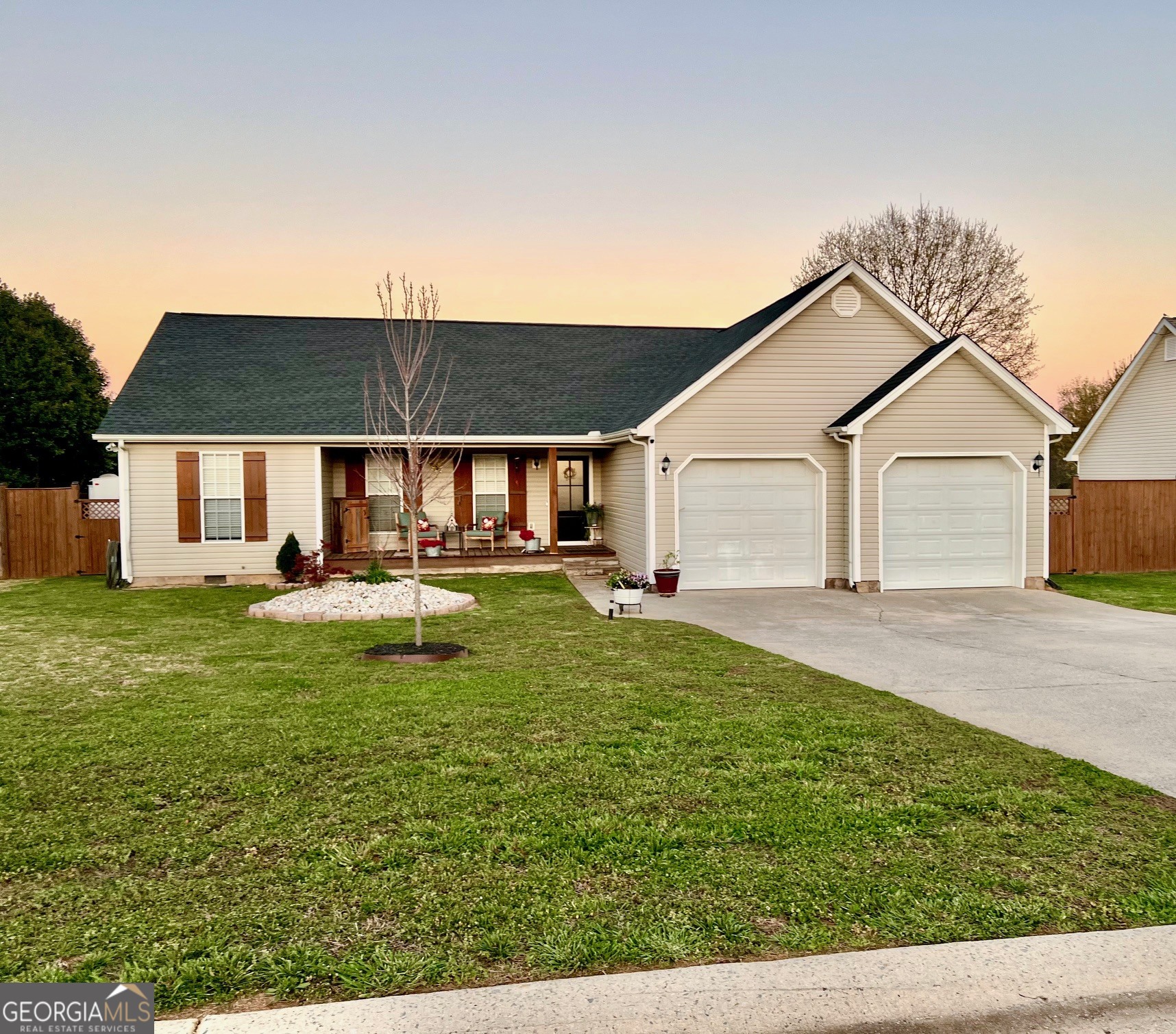 427 Chandler's Ridge Drive Chatsworth, GA 30705 - Photo 5 of 40 a house view with a sitting space and garden