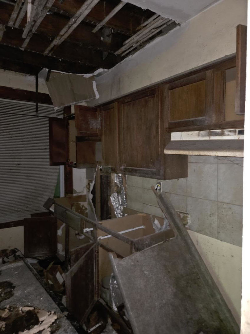 7116 South Lafayette Avenue Chicago, IL 60621 - Photo 2 of 10 a view of a room with gym equipment