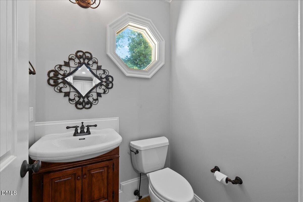 7324 Sparhawk Road Wake Forest, NC 27587 - Photo 56 of 74 Half bath on main level