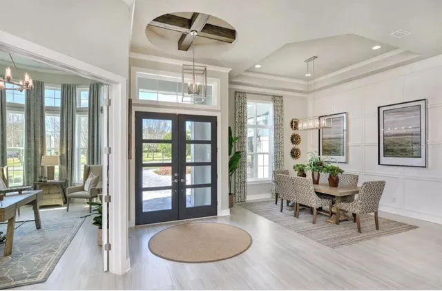 a living room with furniture and a table