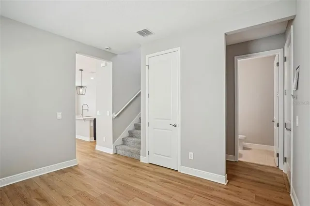 a view of entryway with wooden floor