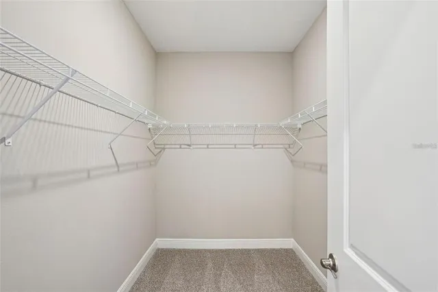 a view of a room with racks on the wall