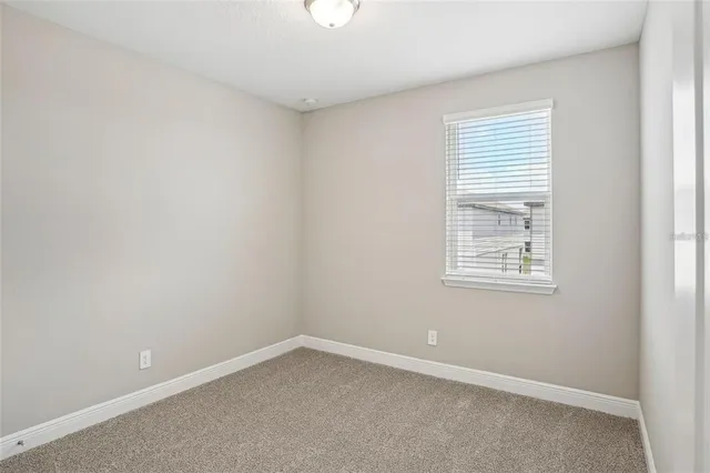 an empty room with a window