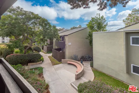 a view of a front of a house with a yard