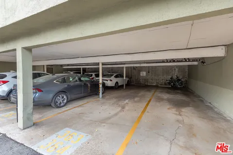 a view of street with palm trees