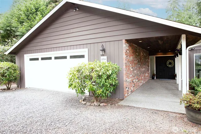 a view of a backyard with plants