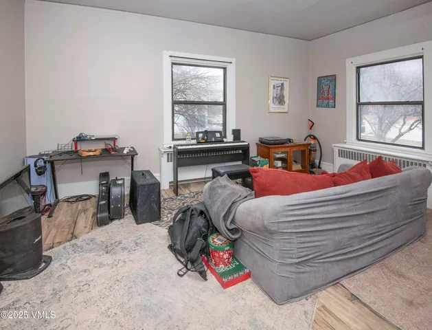 a bed room with a bed and a window