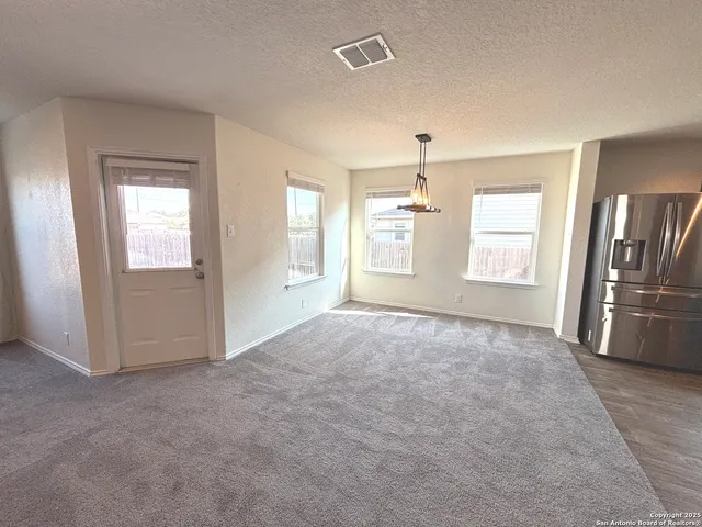 a view of livingroom with hardwood floor and window