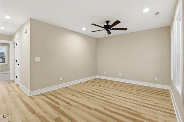 a kitchen with a sink and a refrigerator