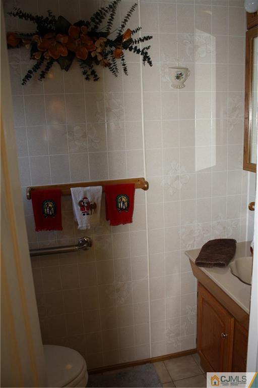 179 Princeton Road Old Bridge, NJ 08859 - Photo 14 of 24 a close view of a refrigerator in a bathroom