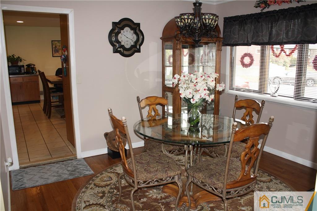 179 Princeton Road Old Bridge, NJ 08859 - Photo 8 of 24 a view of a dining room with furniture and chandelier
