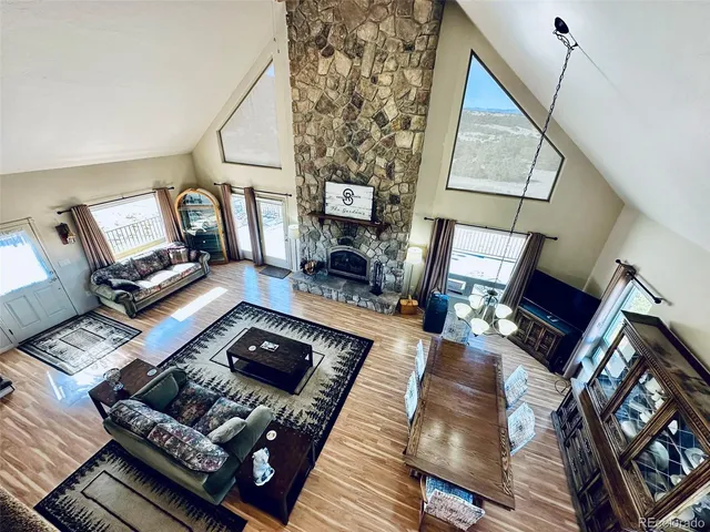 a bathroom with a sink vanity granite and toilet