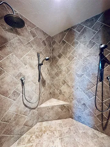 a view of a house with snow on the background