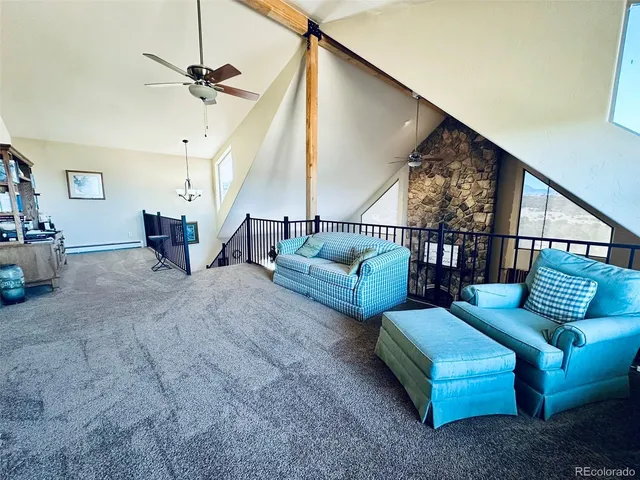a view of a house with a yard covered in snow
