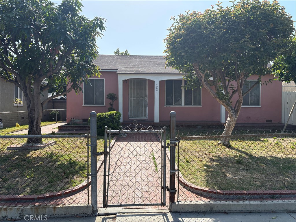 14023 Studebaker Road Norwalk, CA 90650 - Photo 3 of 33 a view of a house with backyard porch and sitting area