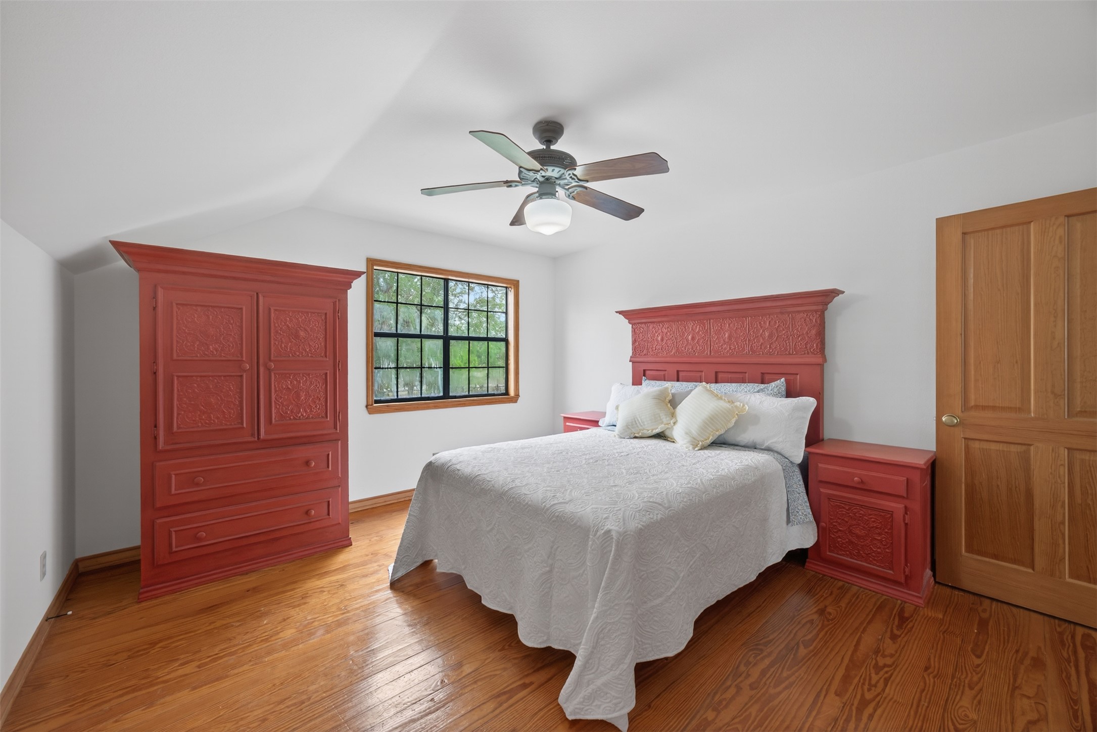 1077 Burdette Wells Road Lockhart, TX 78644 - Photo 19 of 38 a bedroom with a bed and a window
