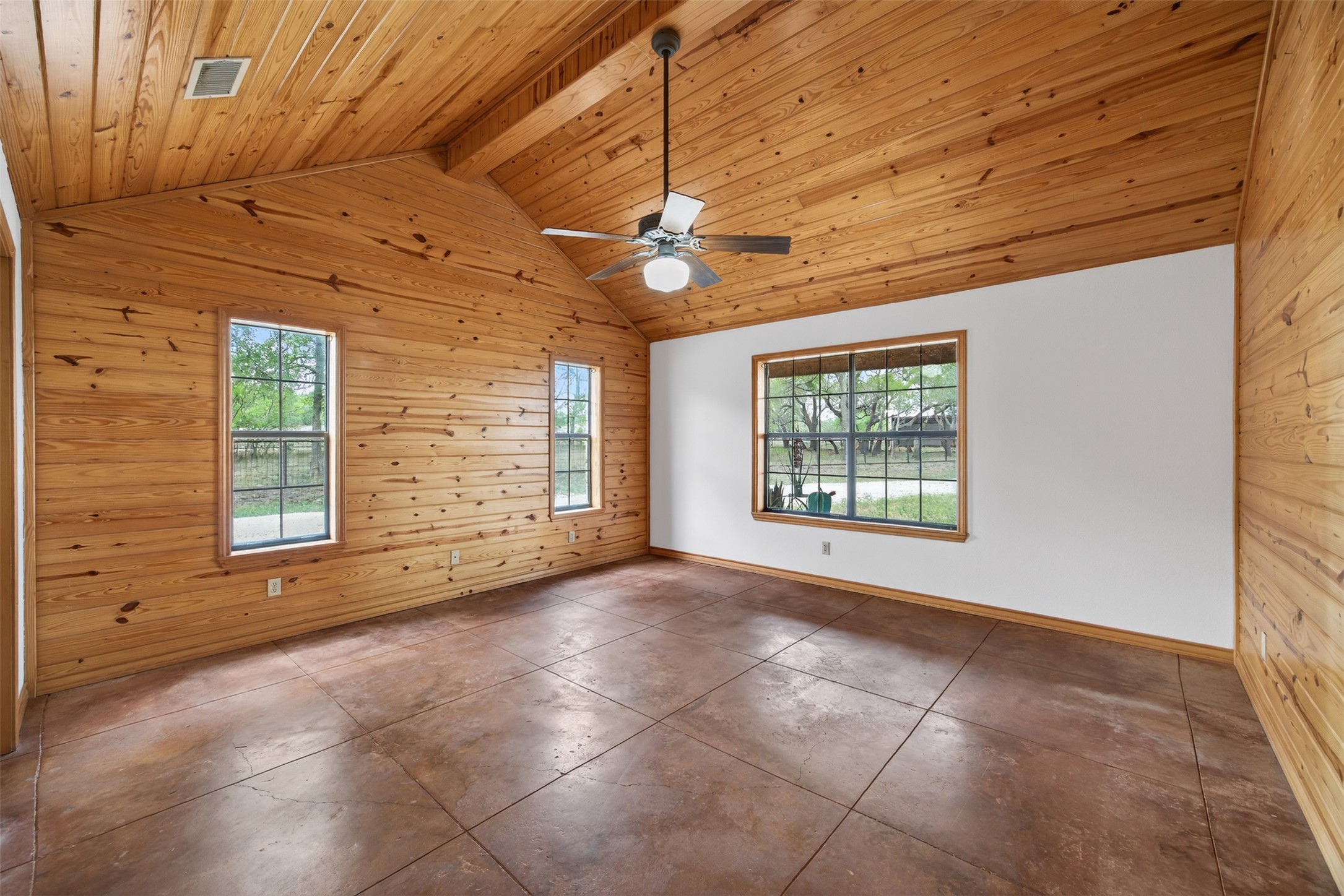 1077 Burdette Wells Road Lockhart, TX 78644 - Photo 21 of 38 a view of an empty room with a window