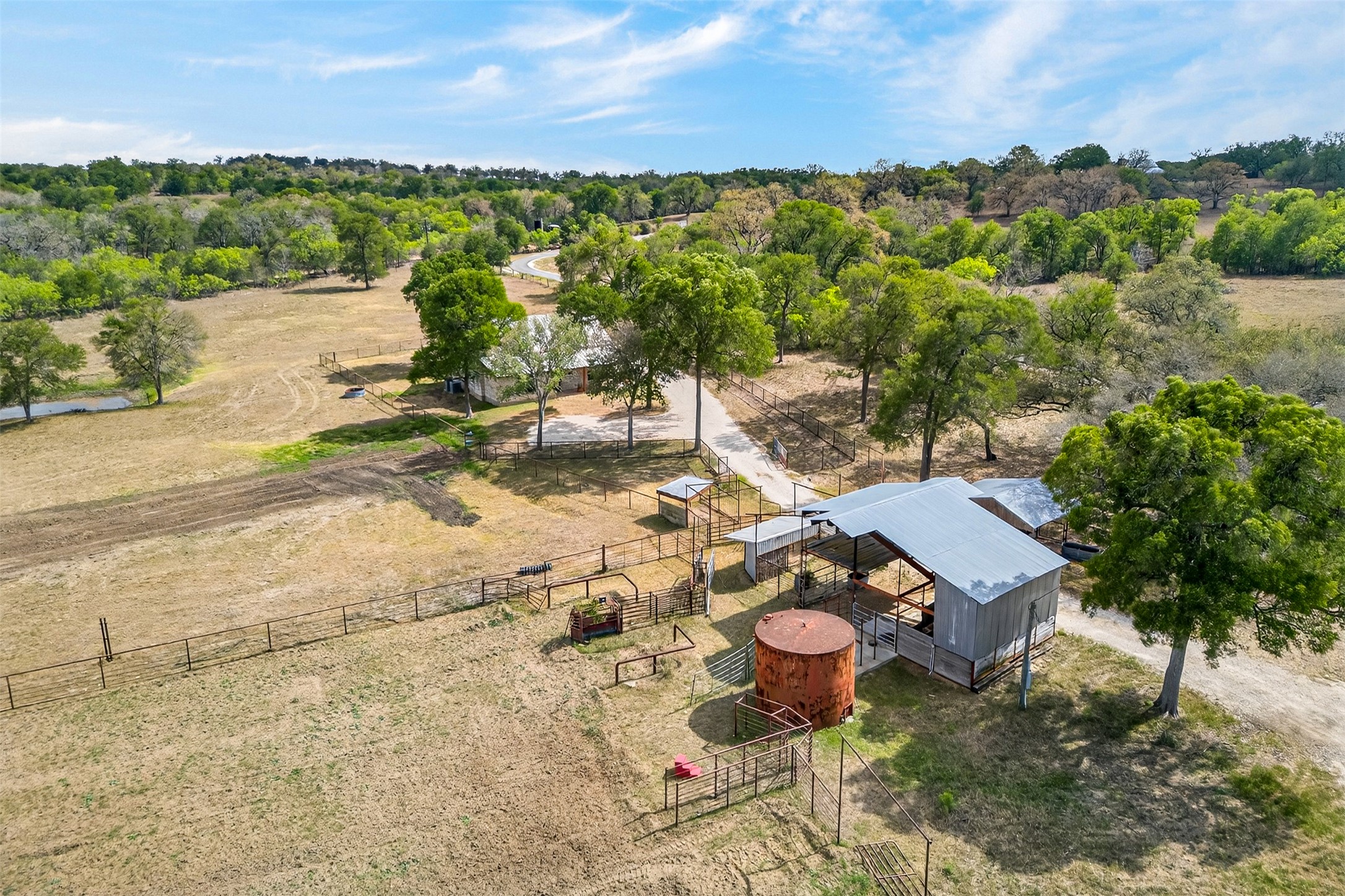 1077 Burdette Wells Road Lockhart, TX 78644 - Photo 27 of 38 a view of a lake with outdoor space