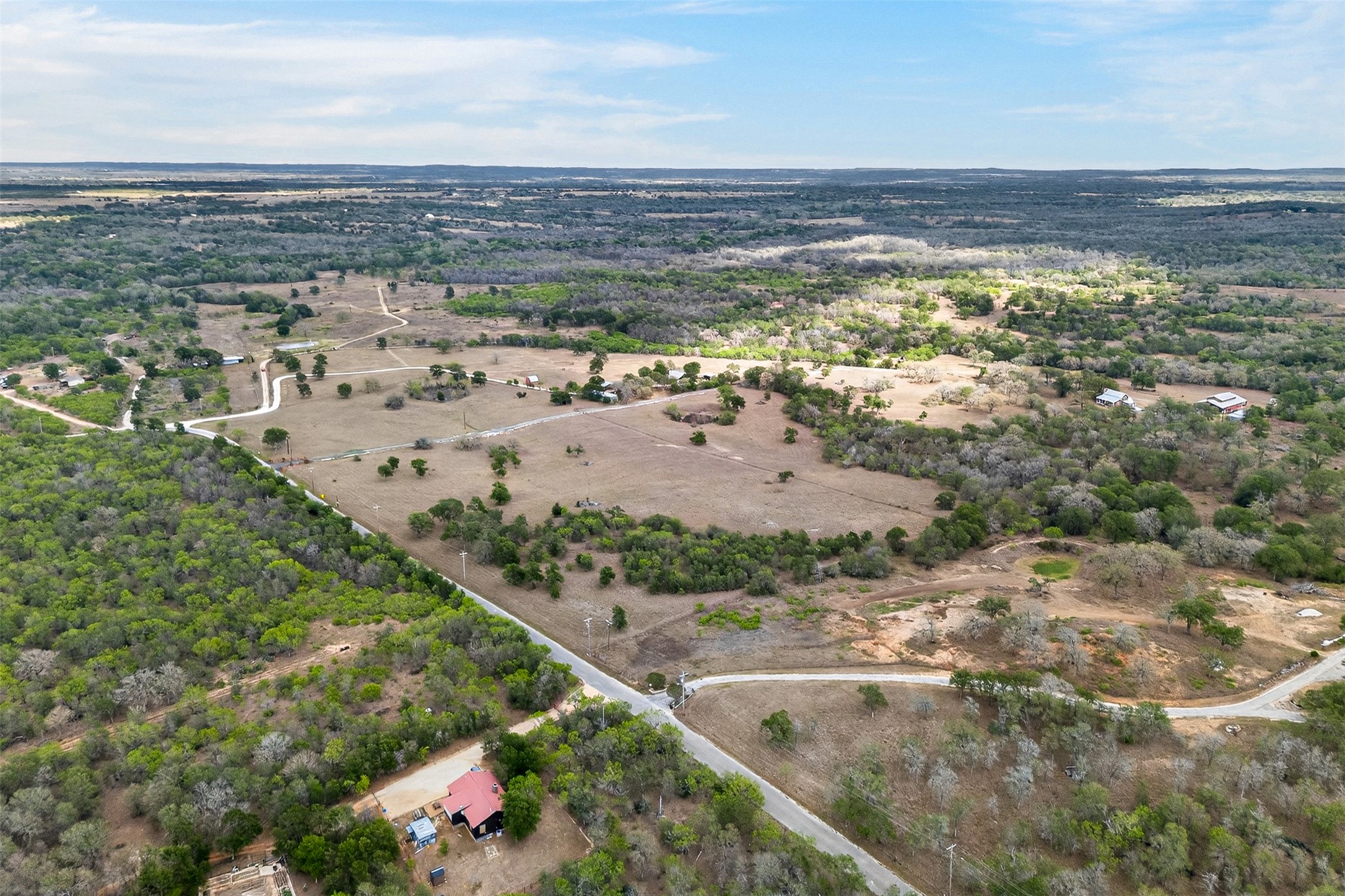 1077 Burdette Wells Road Lockhart, TX 78644 - Photo 36 of 38 a view of an ocean and beach