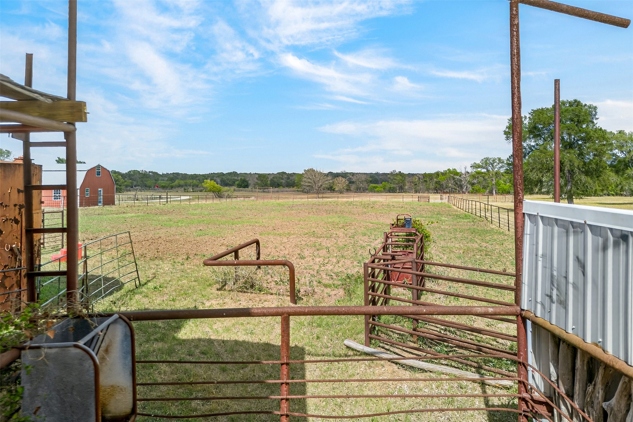 1077 Burdette Wells Road Lockhart, TX 78644 - Photo 6 of 38 a view of a lake with a terrace