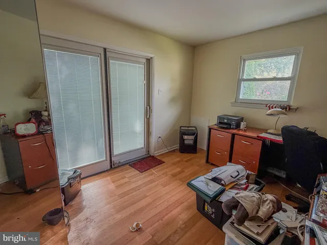 a workspace with furniture and window