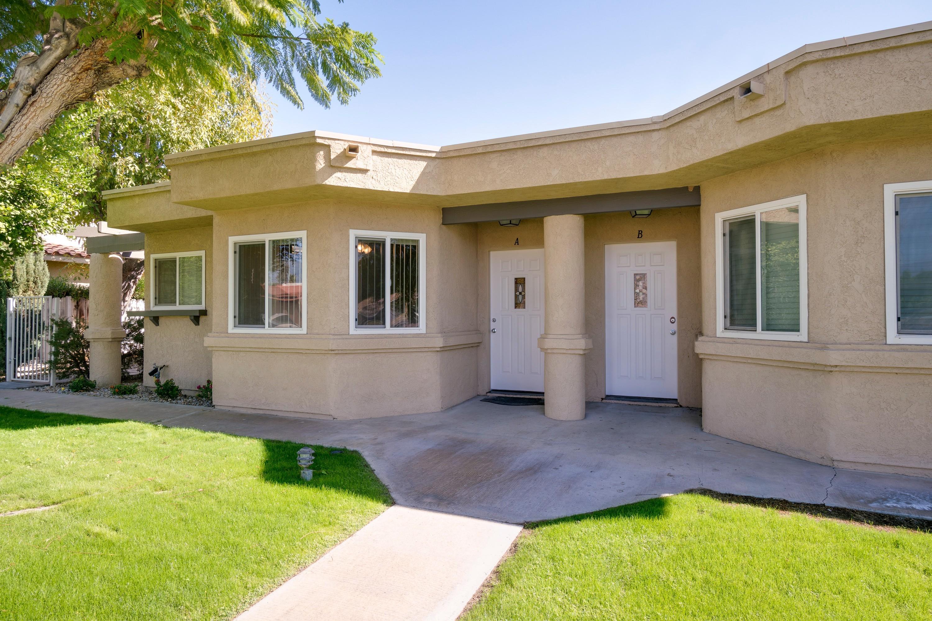 a view of a house with a swimming pool