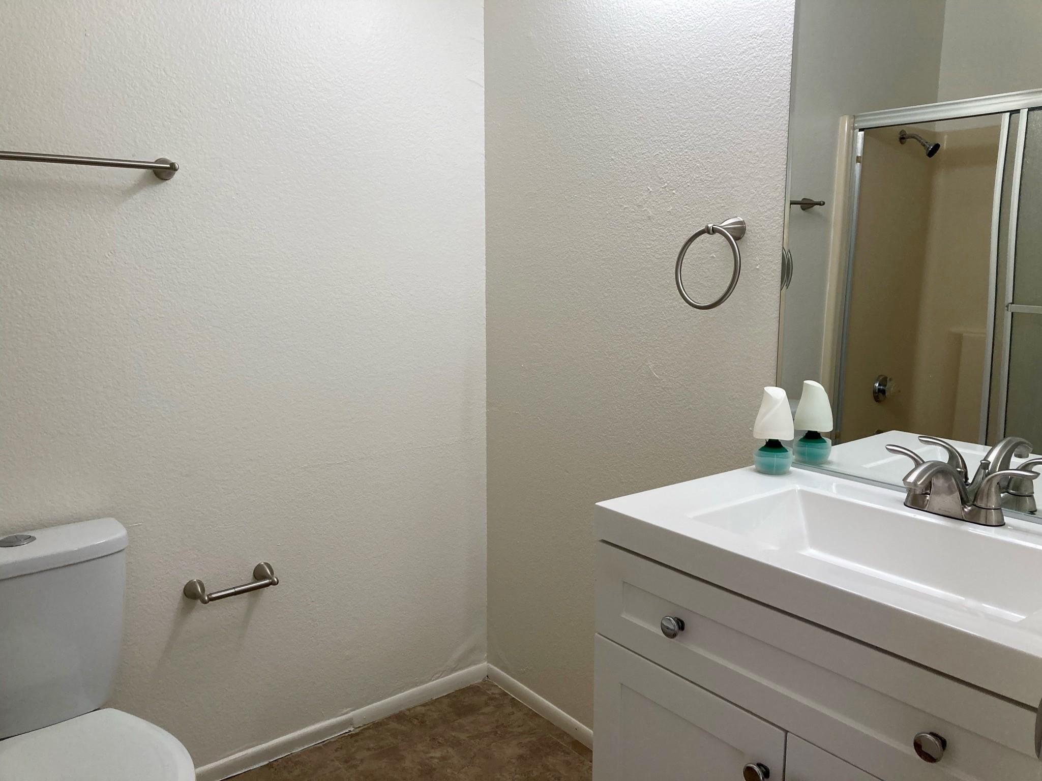 41680 Maroon Town Road, Unit B Bermuda Dunes, CA 92203 - Photo 15 of 19 a bathroom with a sink and a mirror