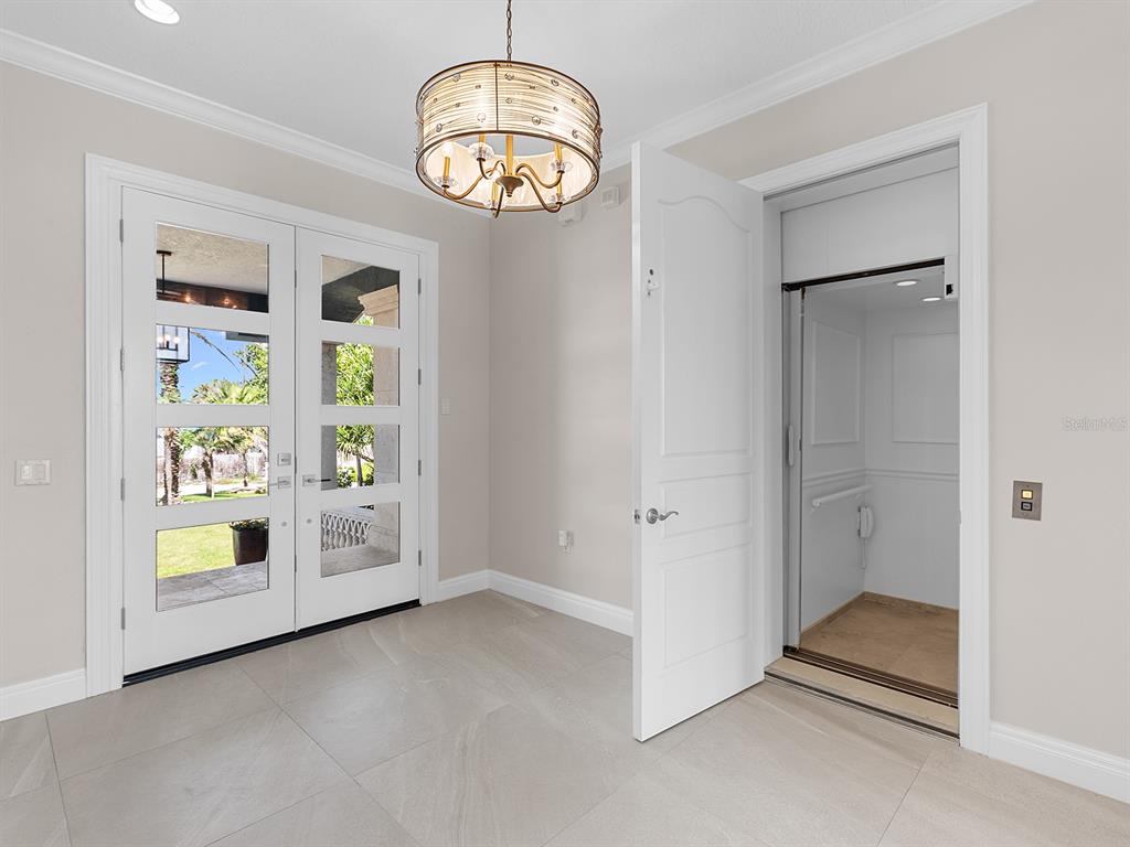 144 North Casey Key Road Nokomis, FL 34275 - Photo 11 of 54 a view of an empty room with a window