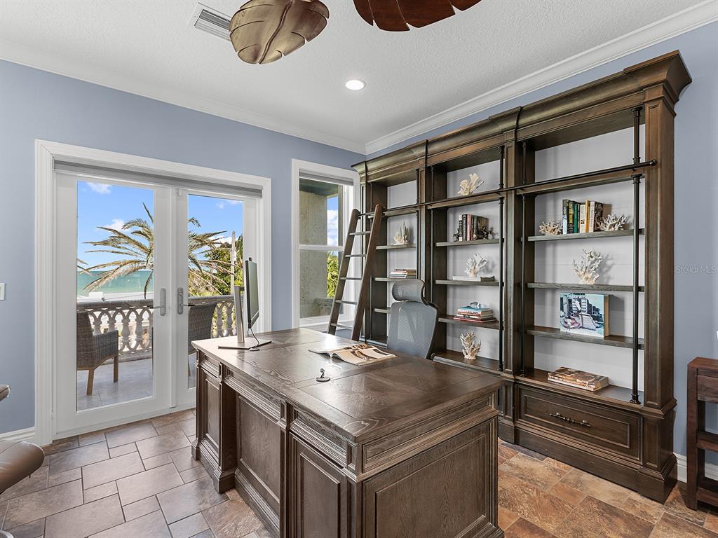144 North Casey Key Road Nokomis, FL 34275 - Photo 31 of 54 a kitchen with a stove and a refrigerator