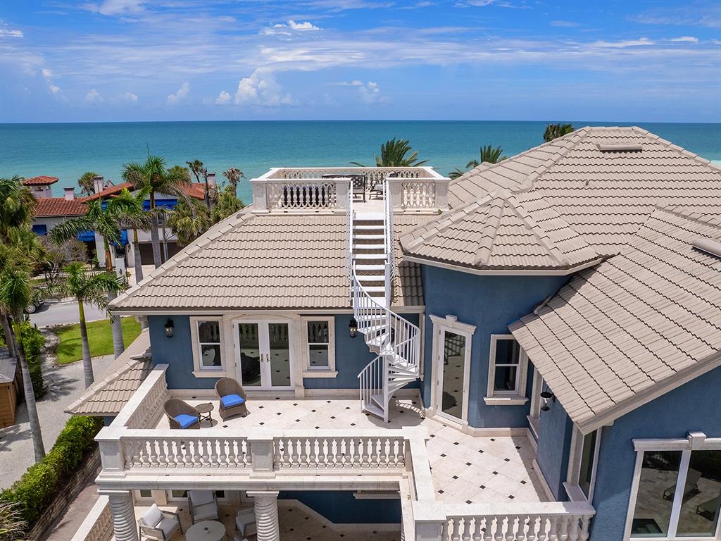 144 North Casey Key Road Nokomis, FL 34275 - Photo 42 of 54 a view of a kitchen with an outdoor seating