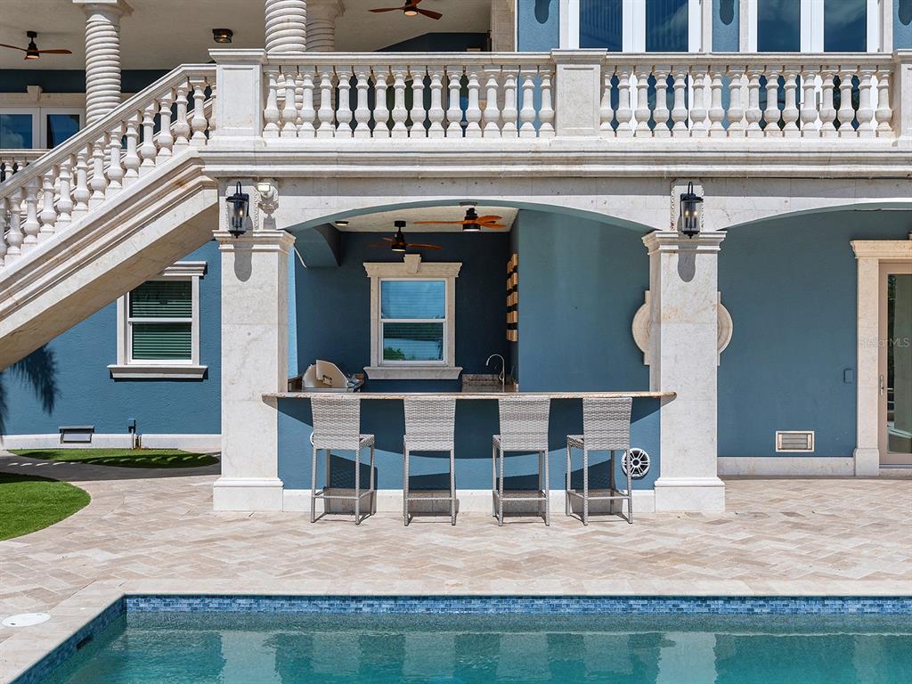 144 North Casey Key Road Nokomis, FL 34275 - Photo 44 of 54 a view of a house with sitting area and sitting area