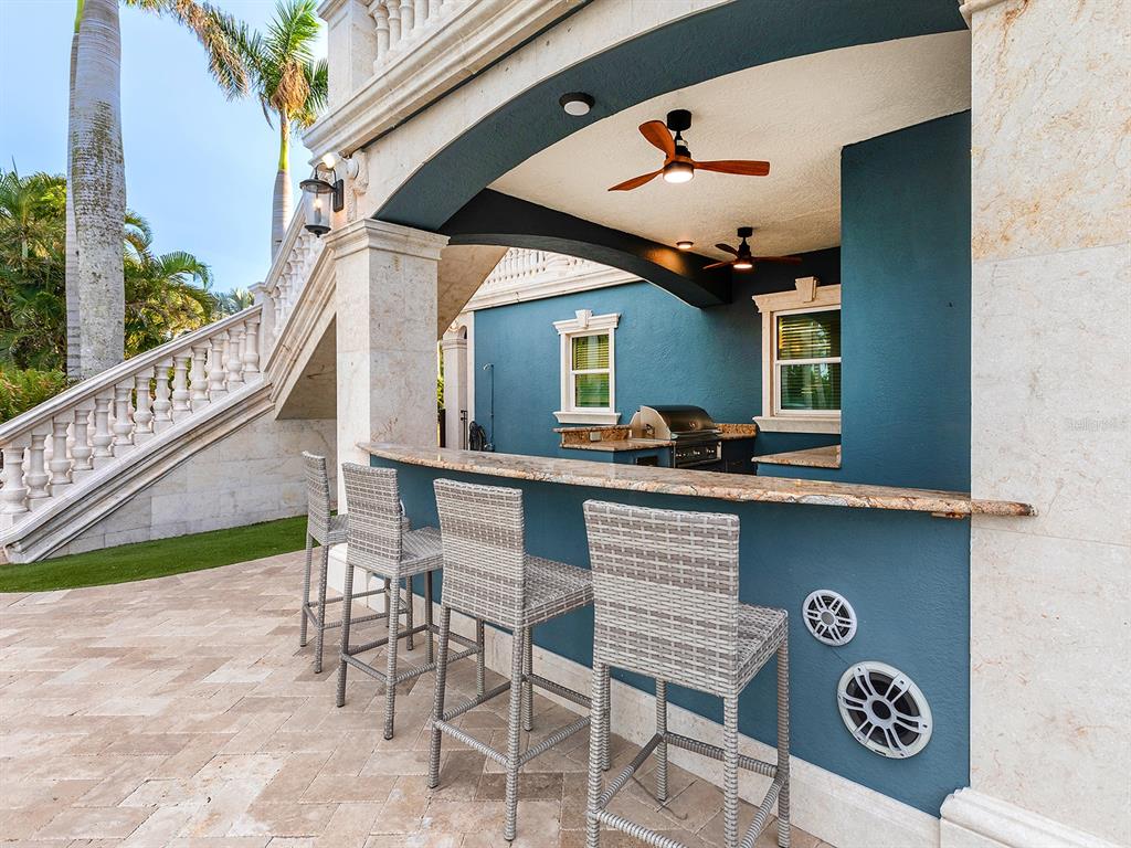 144 North Casey Key Road Nokomis, FL 34275 - Photo 45 of 54 a view of a chairs and table in the balcony