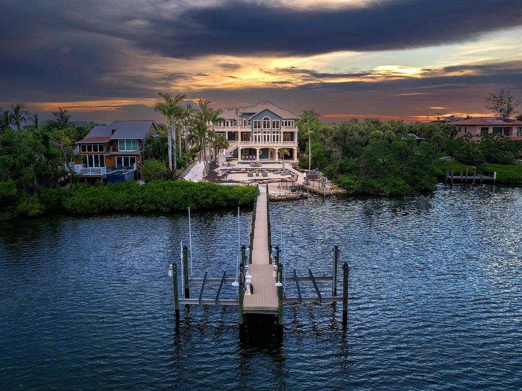 144 North Casey Key Road Nokomis, FL 34275 - Photo 5 of 54 a view of a terrace with a lake view