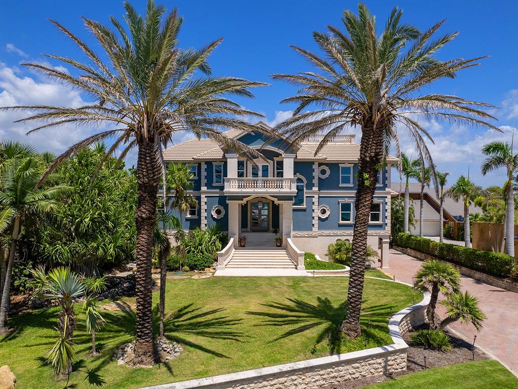 144 North Casey Key Road Nokomis, FL 34275 - Photo 8 of 54 a view of a house with a yard