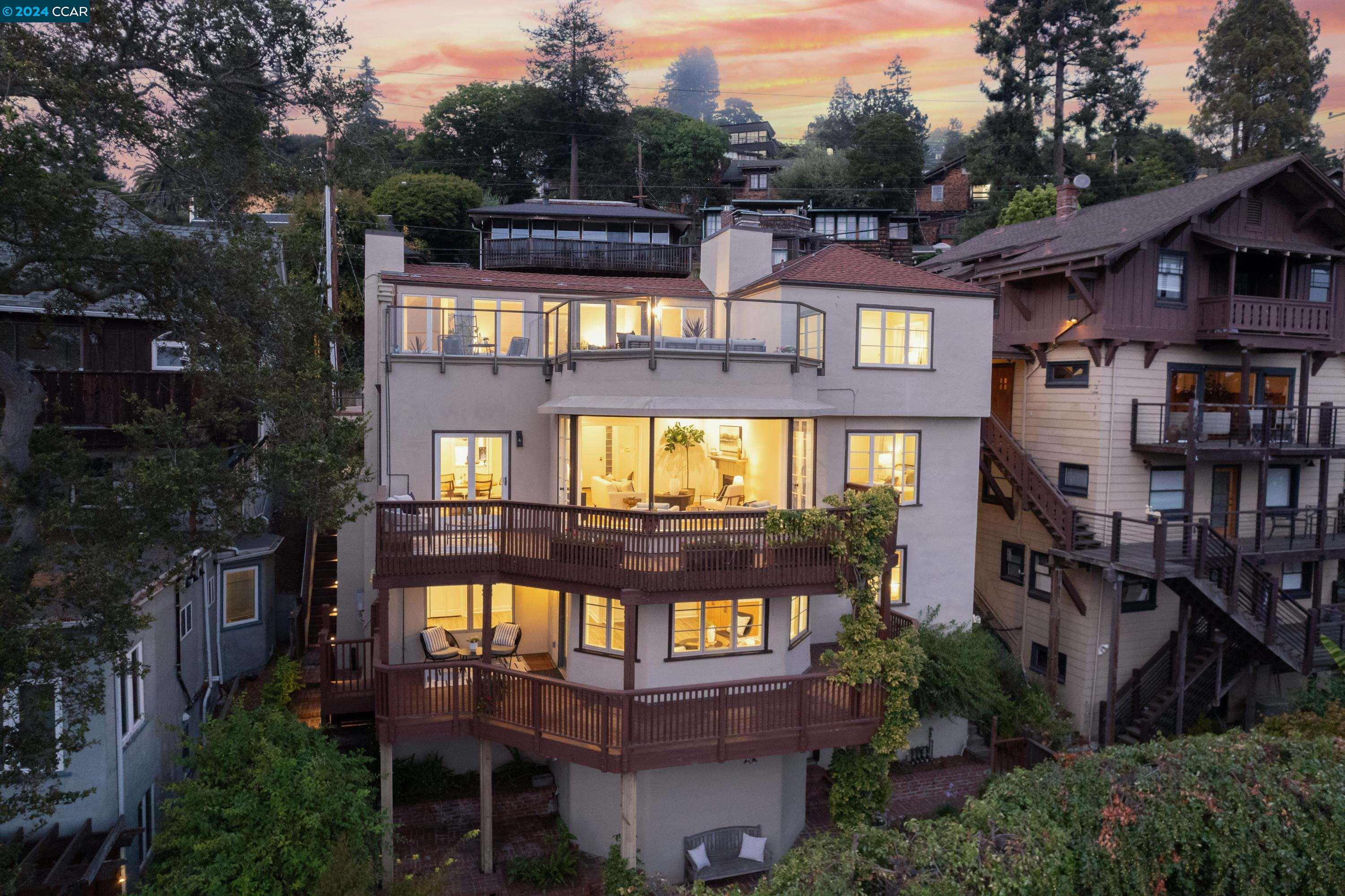 a front view of a residential apartment building with a yard