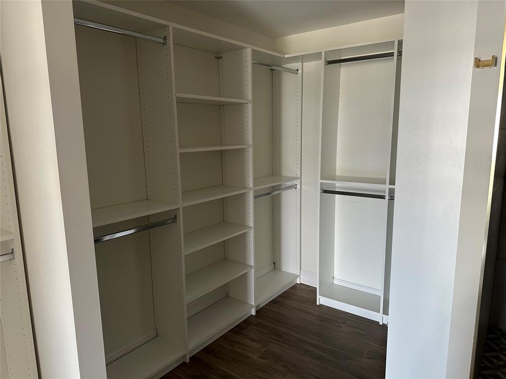 3550 Galt Ocean Drive, Unit 1907 Fort Lauderdale, FL 33308 - Photo 15 of 28 a view of walk in closet with wooden floor